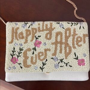 Elegant Cream and Tan Clutch with Beadwork and Floral Design